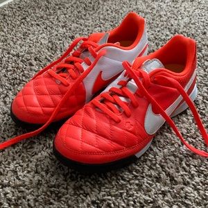 Limited edition Nike tennis shoes in bright orange